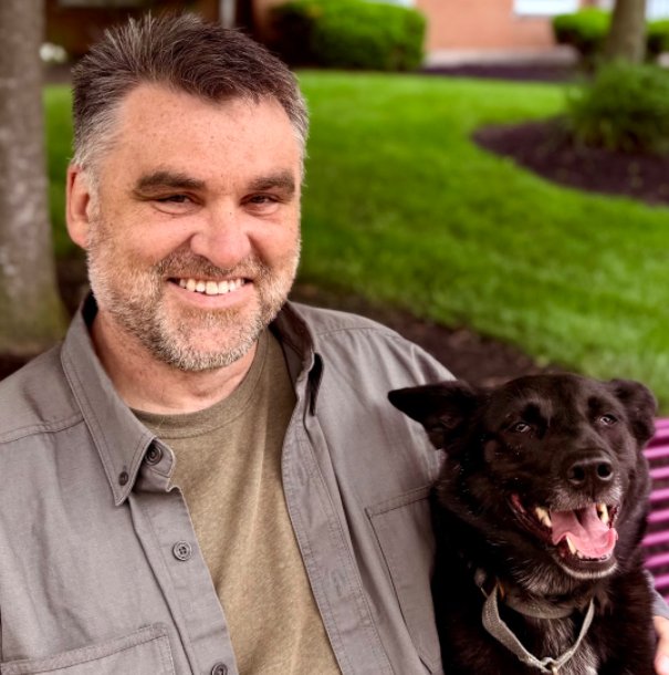 Adam Sutherland with a dog